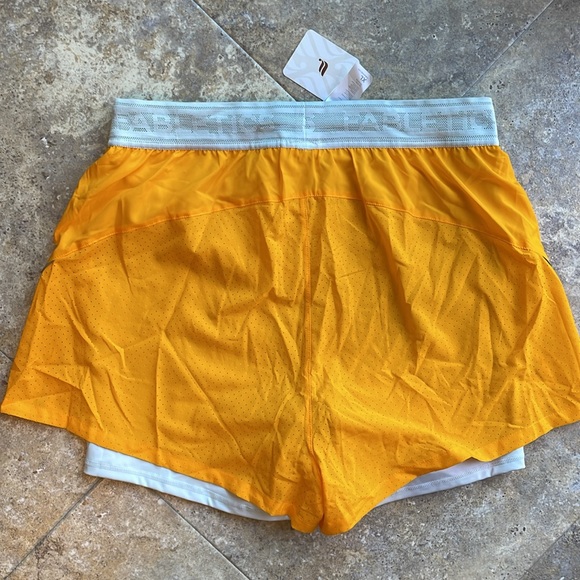 NWT women’s XL Fabletics 5” perforated run shorts - built in compression shorts. - Picture 4 of 4